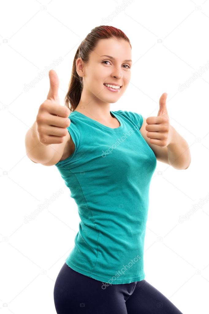 Female athlete making thumbs up