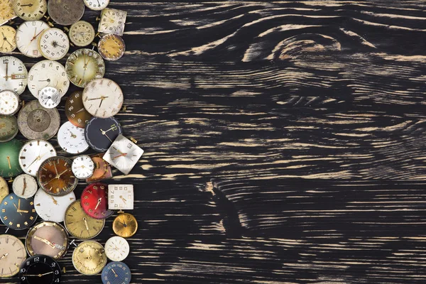 Old watches on a dark wooden  background. — Stock Photo, Image