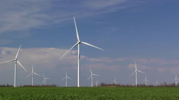 Wind turbines against blue sky — Stock Video