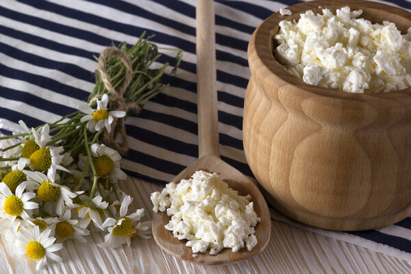 Cottage cheese and chamomile flowers