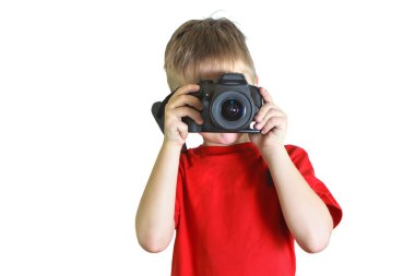 Çocuk bir photocamera üzerinde fotoğraf çekmek