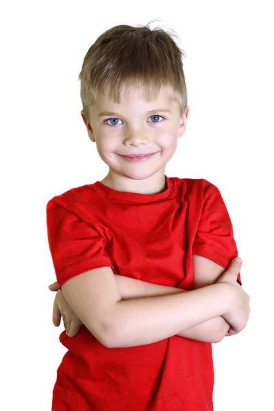 Boy standing and smiling, looking into the camera — Stock Photo, Image