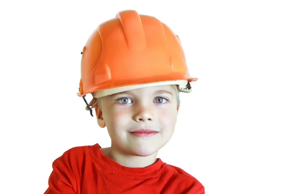 Jongen in een bouw-helm — Stockfoto