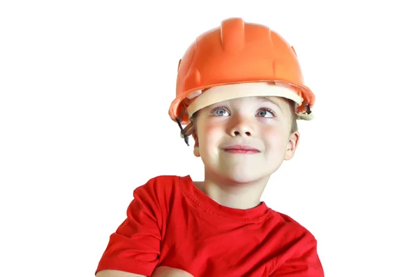 Jongen in de bouw helm glimlachen — Stockfoto