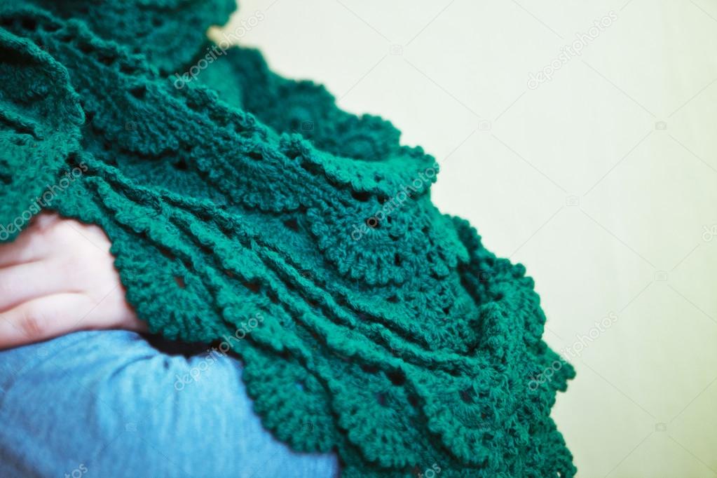 Green knitted shawl