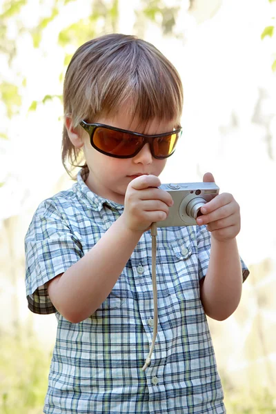 Boy with digital camera — Stock Photo, Image