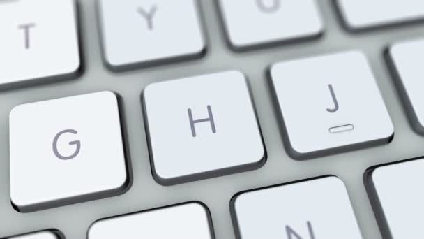 Кнопка загрузки на клавиатуре компьютера — стоковое видео