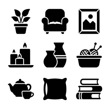 Dokuz siyah siluet simgesi ev konforunu ve kızlık zarını temsil ediyor. Bir bitki, koltuk, resim çerçevesi, mumlar, vazolar, iplik, çaydanlık, yastık ve kitaplar içerir.