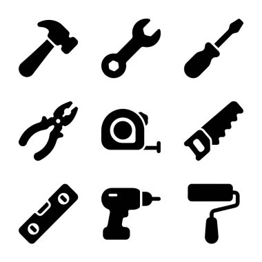 Katı siyah kabartma biçiminde dokuz temel donanım ve inşaat aleti simgesinden oluşan bir koleksiyon. Çekiç, anahtar, tornavida, pense, mezura, testere, seviye, matkap ve boya silindiri içerir.