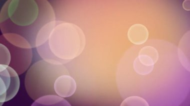 Değişik boyut ve renklerde yumuşak, bulanık bokeh ışıkları içeren büyüleyici soyut bir arka plan döngüsü rüya gibi ve ruhani bir atmosfer yaratıyor..