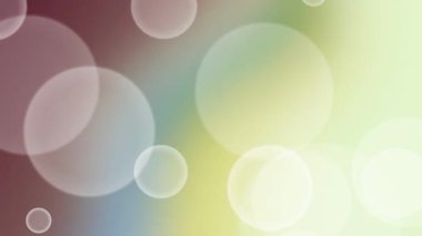 Çeşitli boyutlarda yumuşak, bulanık bokeh daireler içeren büyüleyici bir soyut zemin döngüsü, yumuşak ve serin renklerin gradyanı boyunca yavaşça hareket ediyor..