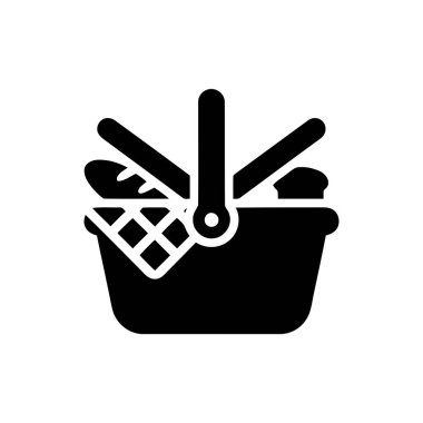 Ekmek ve diğer şeylerle dolu piknik sepeti açık hava yemekleri ve boş zaman aktiviteleri için mükemmeldir.