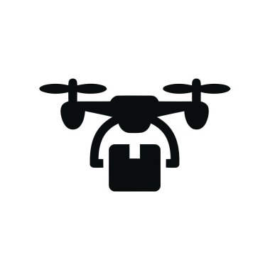 İnsansız hava aracı, modern teslimat hizmeti için bir paket taşıyor.