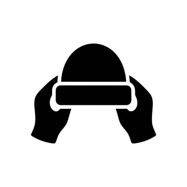 Beanie iki elle tutuluyor basit bir simgesel siyah-beyaz çizim.