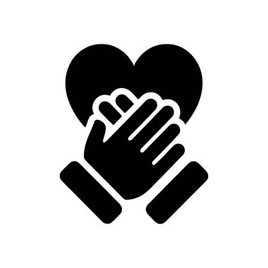 Toplum ve insanlık için sevgi ve desteğin sembolünü kucaklayan özenli eller.