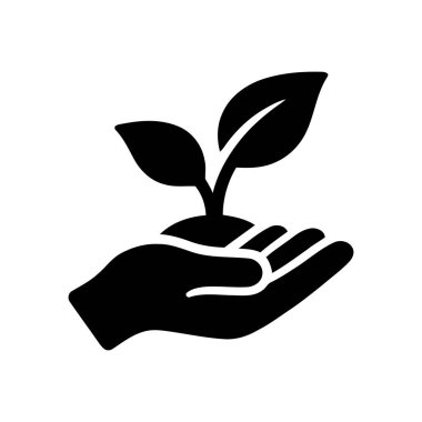 İki yeşil yapraklı bitki, insan elinde nazikçe tutularak doğa bakımını ve çevresel büyümeyi sembolize eder.