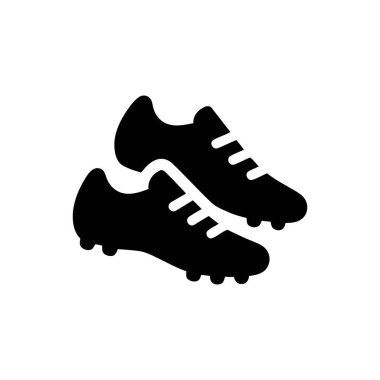 Spor yapmak için siyah çizme giyer.