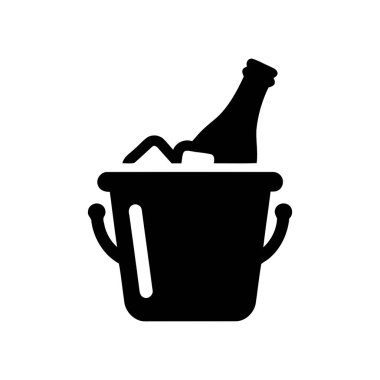 Kutlama için bir şişe köpüklü şarap ve buz dolu şampanya kovası.