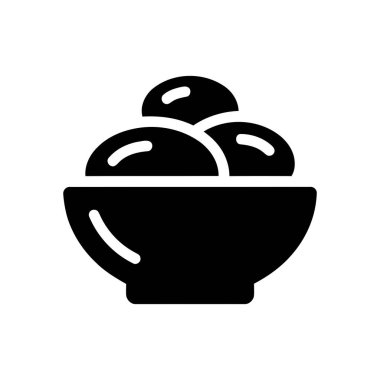 Dondurma kepçeleri bir kasede servis edilir yaz için mükemmel taze ve tatlı bir tatlı