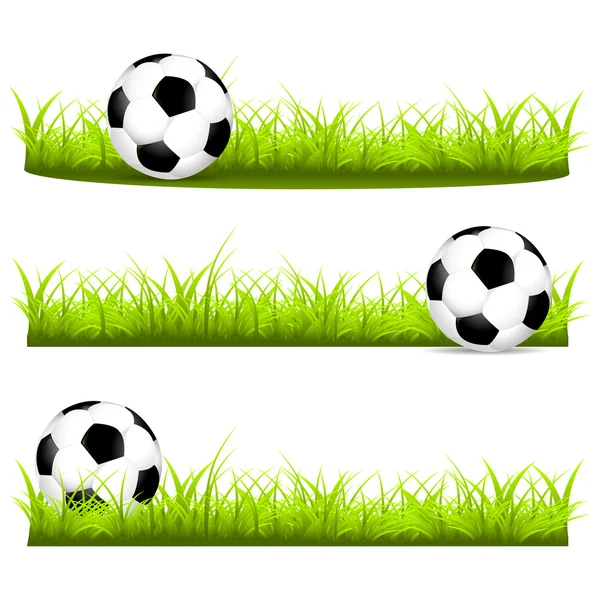 Set avec des balles de football sur une herbe — Image vectorielle