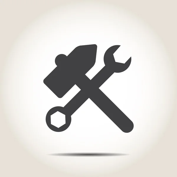 Hammer and wrench on a gray background — Stock Vector