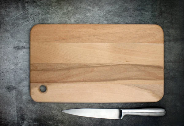 Food cutting board accompanied by a steel knife