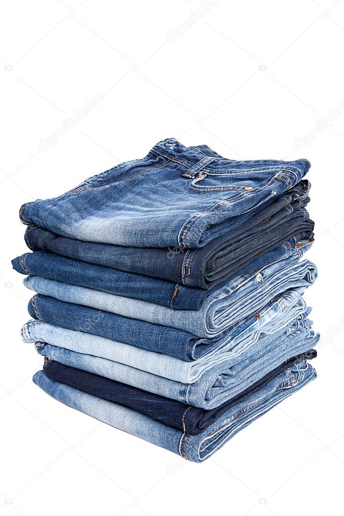 Fashionable clothes.  Jeans on white  background.               