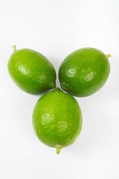 Whole Green Lemon White Background — Stock Photo, Image