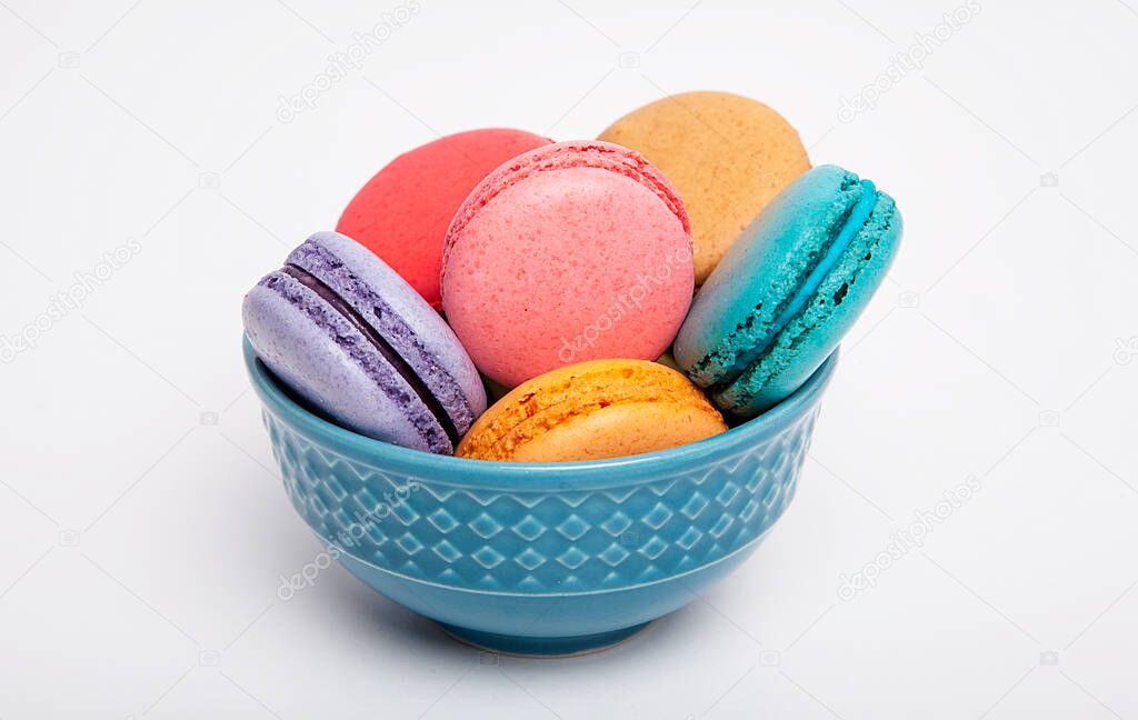  Sweet and colorful macaron on white background. Sweet snacks.