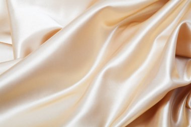 Zarif sarı ipek kumaş arkaplan.