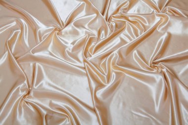 Zarif sarı ipek kumaş arkaplan.