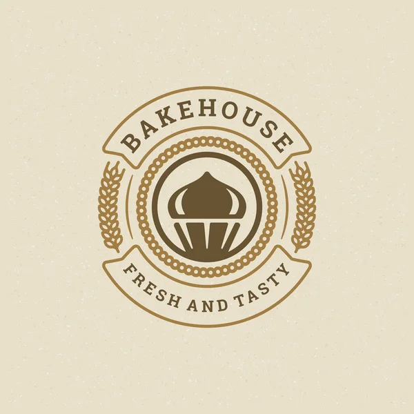 Badge ou étiquette de boulangerie illustration vectorielle rétro cupcake et silhouettes de blé pour boulangerie. — Image vectorielle