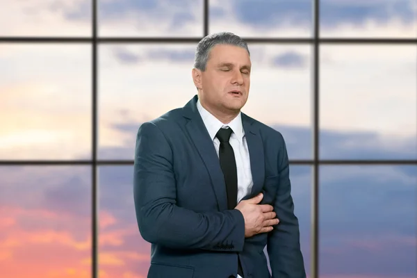 Man heavily stressed at workplace. — Stock Photo, Image