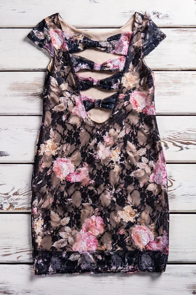 Floral dress with deep neckline. — Stock Photo, Image