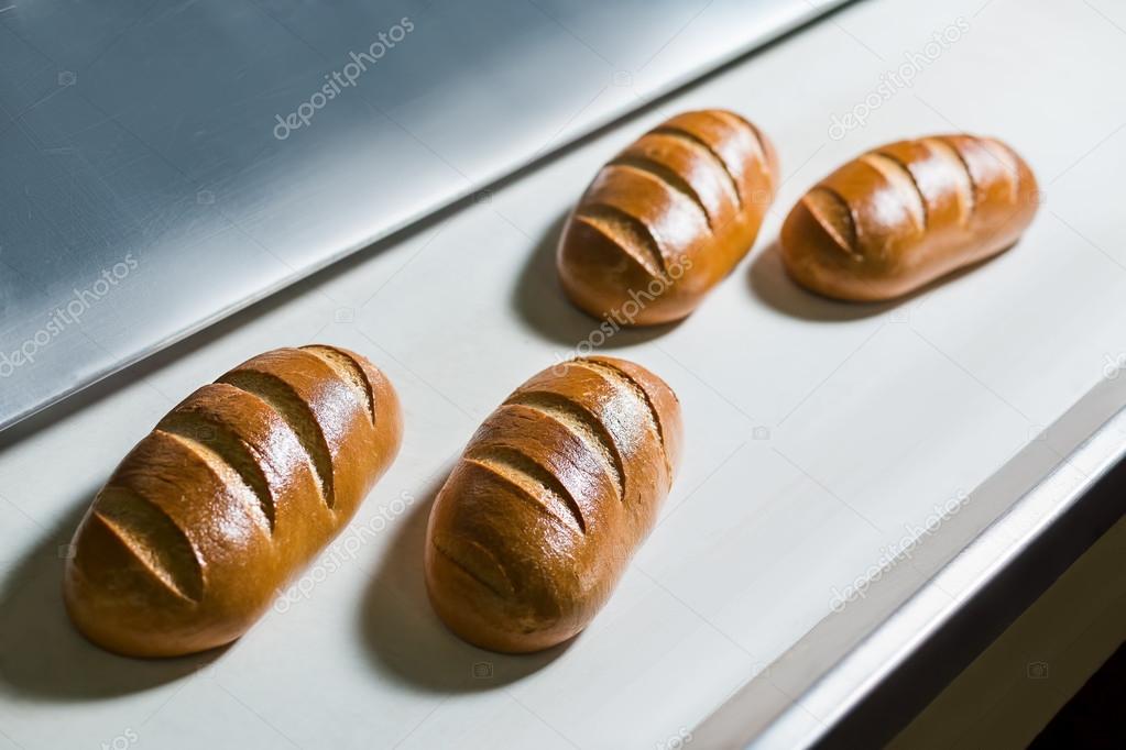 Conveyor with bread.