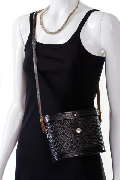 Dark vintage bag on mannequin. — Stock Photo, Image