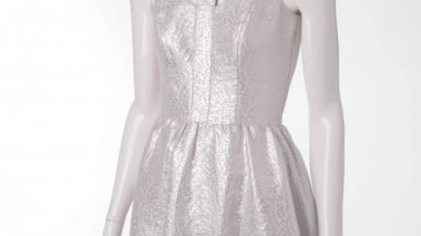 Light silver dress on mannequin.