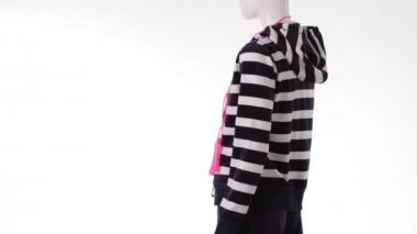 Mannequin in sports hoodie turning.