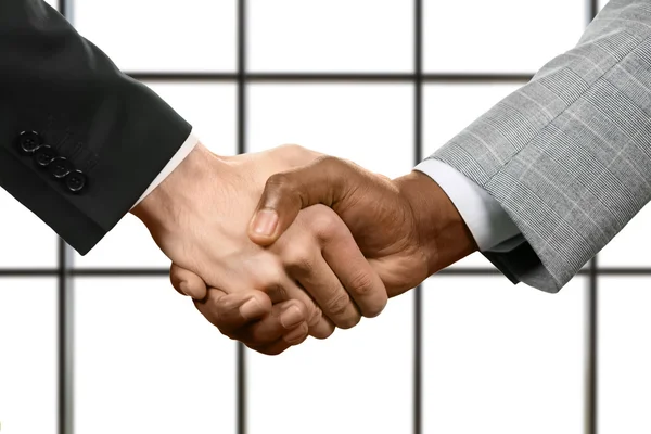 Business handshake on white background. — Stock Photo, Image