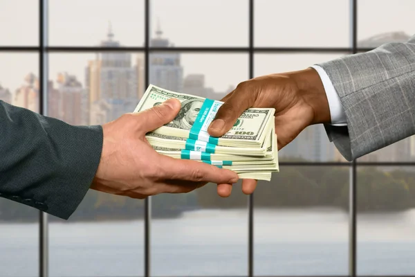 Male hand taking big money. — Stock Photo, Image