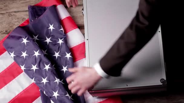 Suitcase, money and US flag. — Stock Video