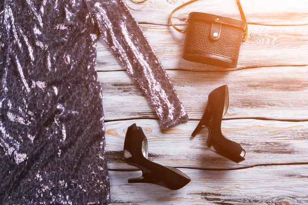 Sparkly dress with black shoes. — Stock Photo, Image