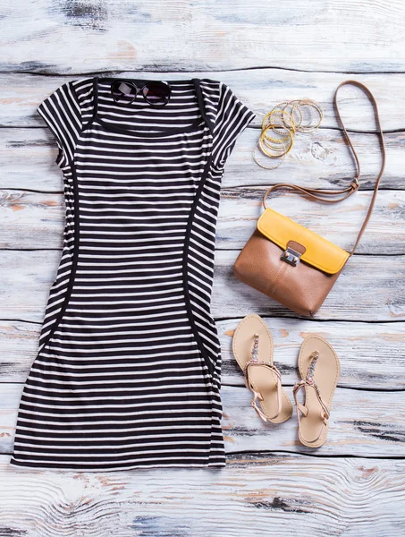 Striped dress with dark sunglasses. — Stock Photo, Image