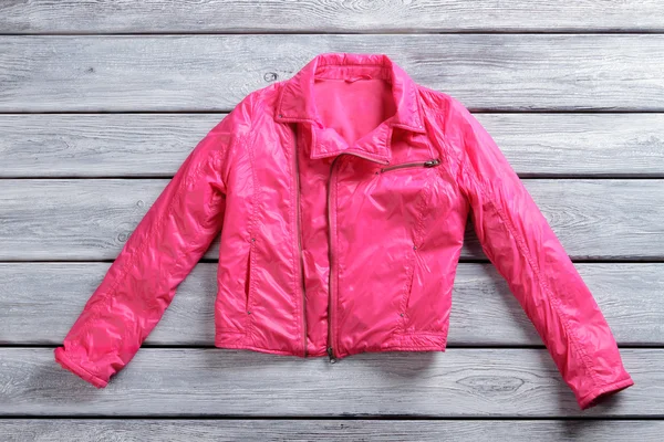 Short pink jacket.