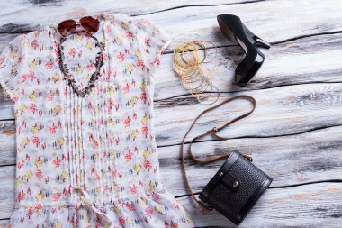 White top with colorful pattern.