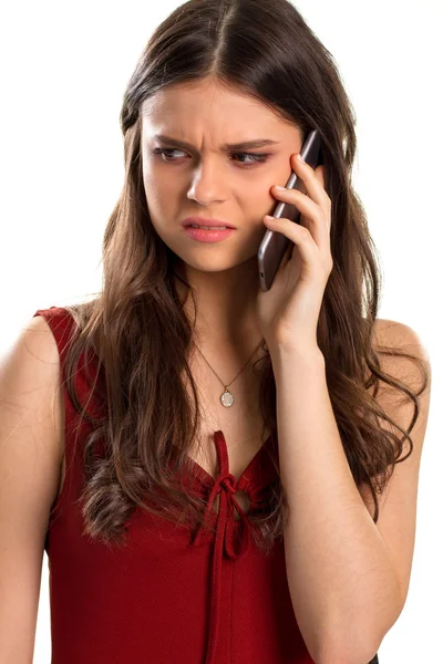 Jovem tem um telefone . — Fotografia de Stock