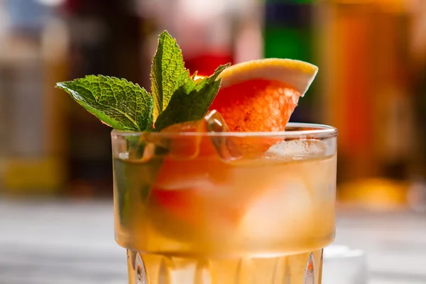 Orange beverage in a glass. — Stock Photo, Image