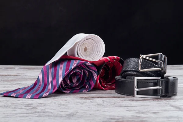 Silk rolled ties and belt. — Stock Photo, Image