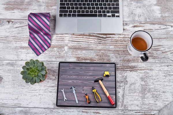 Office workplace and work tools on the tablet screen. — Stock Photo, Image