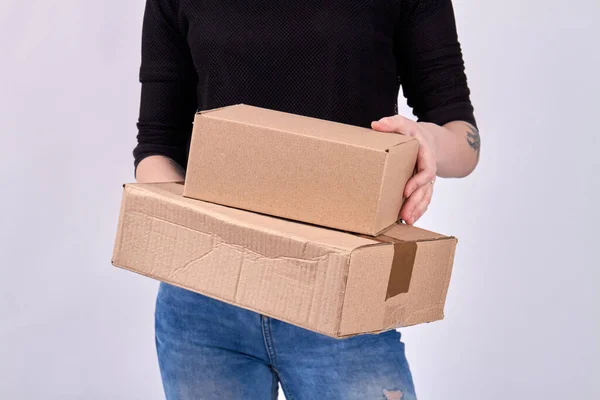 Closeup portrait of courier with cardboard boxes. — Stock Photo, Image